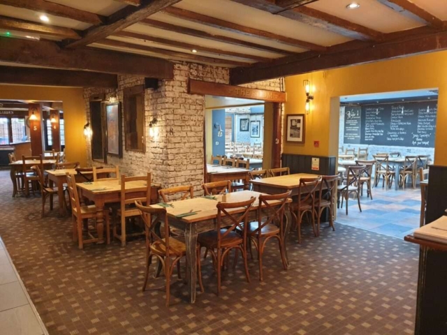 low beam ceiling section of the nags head restaurant in chichester